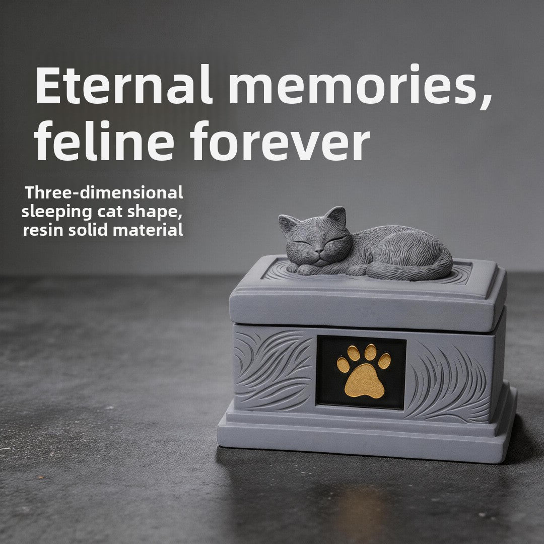 Gray resin pet memorial urn with sleeping cat lid and gold paw emblem front