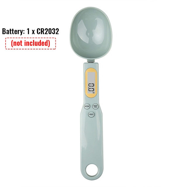 Digital measuring spoon scale, light teal glossy body with LCD screen and spoon bowl