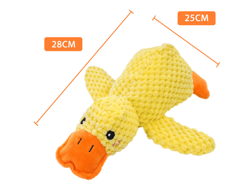 Yellow plush duck toy with orange beak and feet, angled view on white