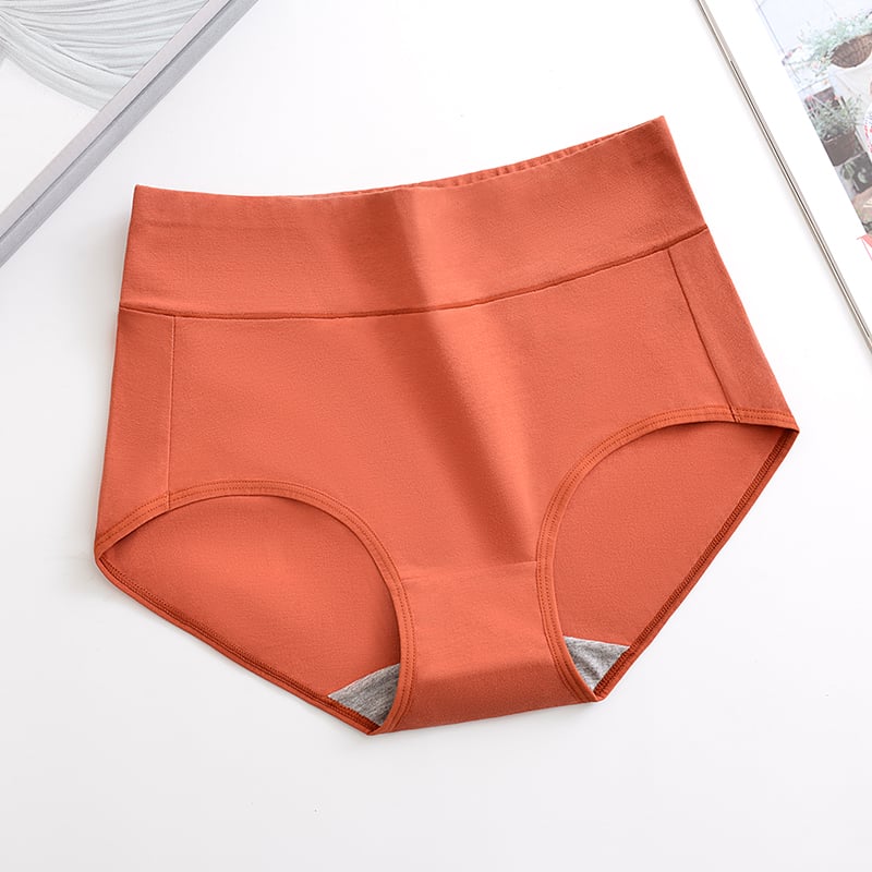 Coral red underwear brief with high-rise waistband and curved leg openings.