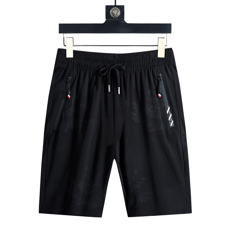 Black athletic shorts front view with elastic waist, drawstring, and zip side pocket zippers