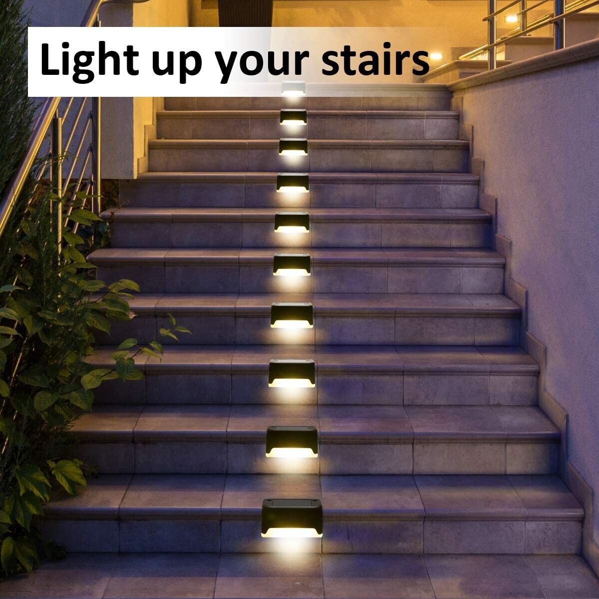 Solar stair step lights with warm glow lined along stone staircase outdoors