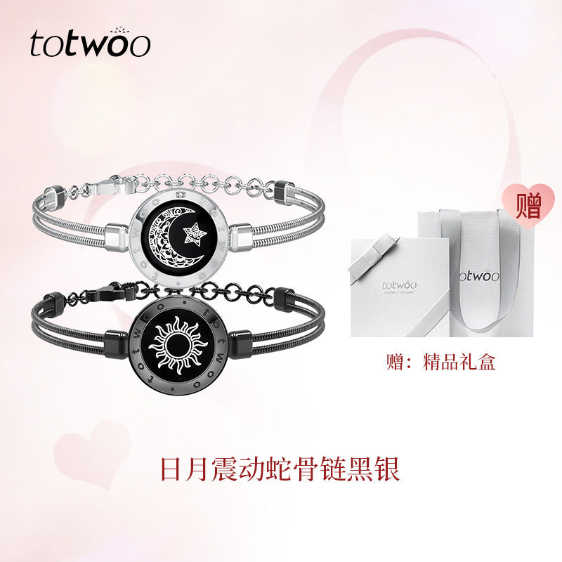 Couples smart bracelet set with silver moon dial and black sun dial, clasped link bands