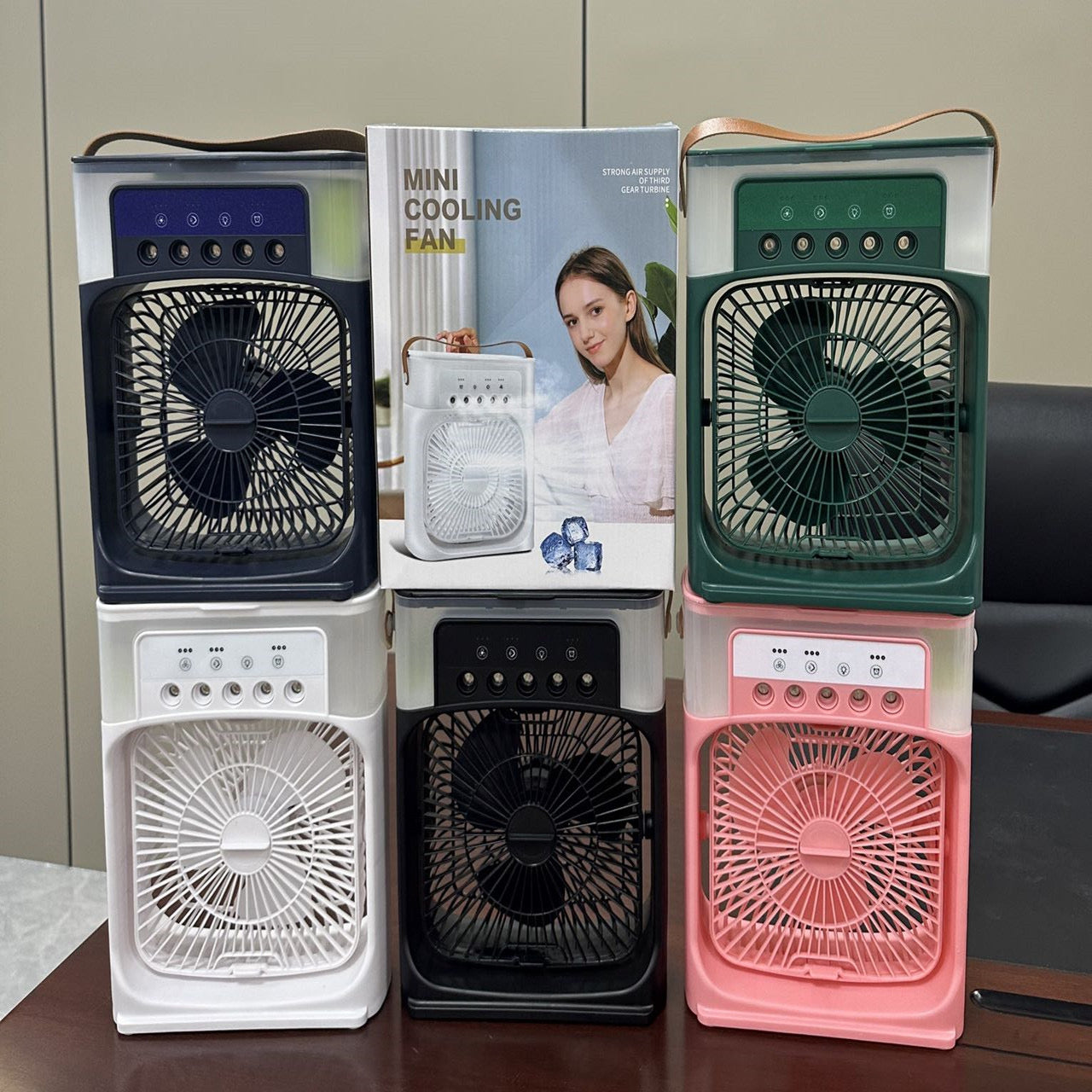 Mini cooling fans set of four in white, black, green, and pink with front grilles