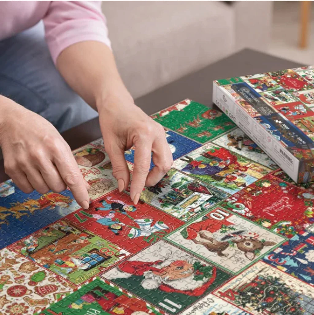 Family assembling colorful Christmas advent jigsaw puzzle with numbered pieces