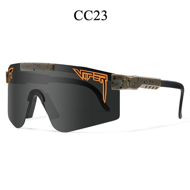 Women's sunglasses with dark gray mirrored lenses and camouflage speckled frame