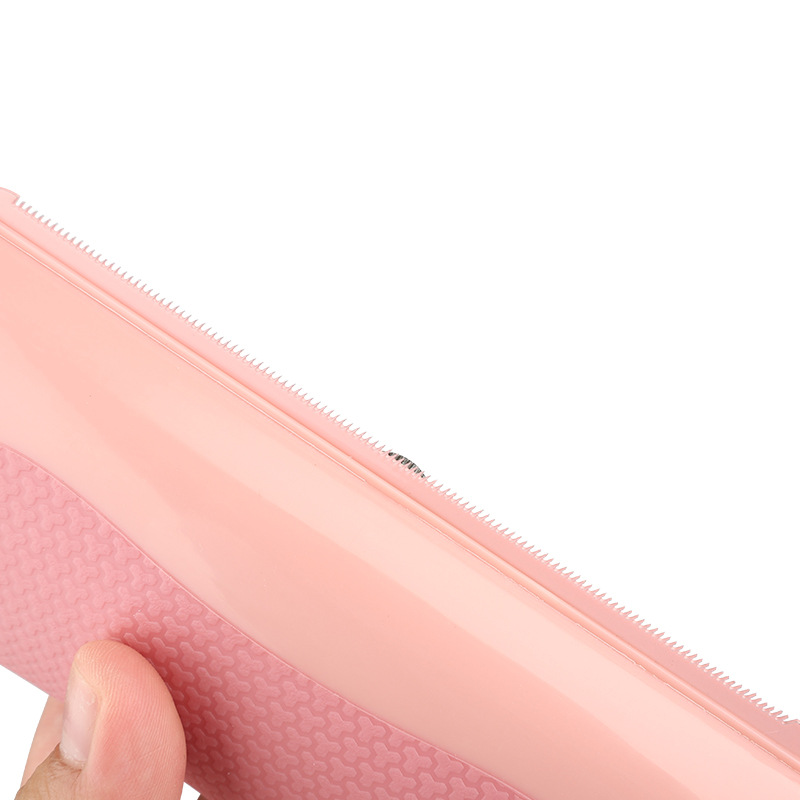 Pink grooming comb edge with fine teeth for detangling and smoothing fur