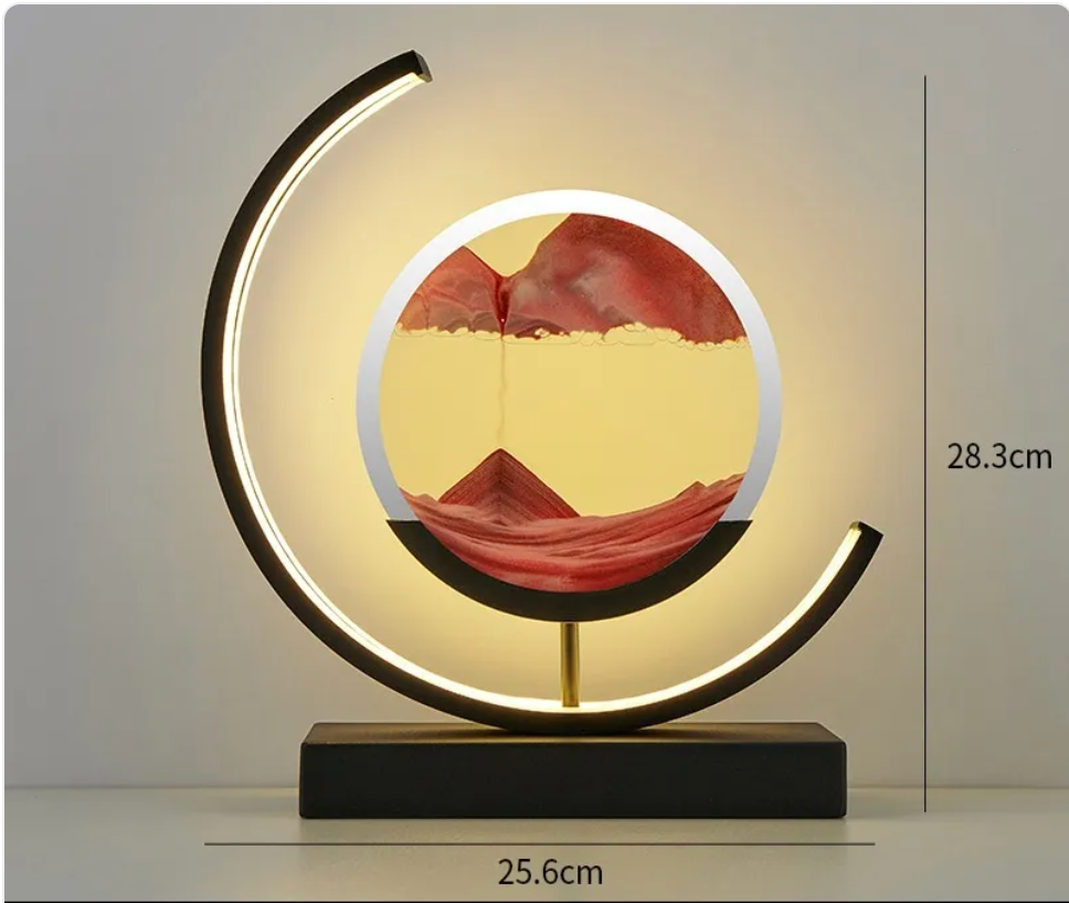 Hourglass table lamp with LED crescent ring and red desert glass panel