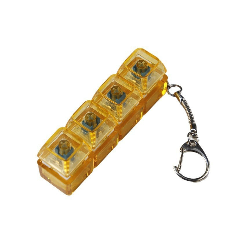 Yellow transparent light-up shaft fidget toy with dark buttons and keychain ring