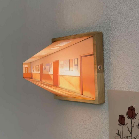 Wooden framed LED night light mounted on textured wall with warm glow