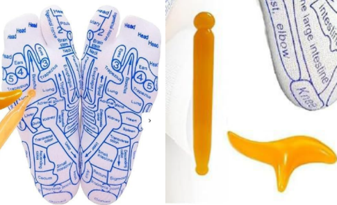 Blue foot-diagram reflexology socks with orange massage roller and fork tools
