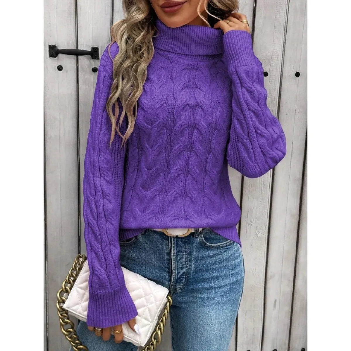 Purple cable-knit turtleneck sweater with ribbed cuffs and chunky cable texture