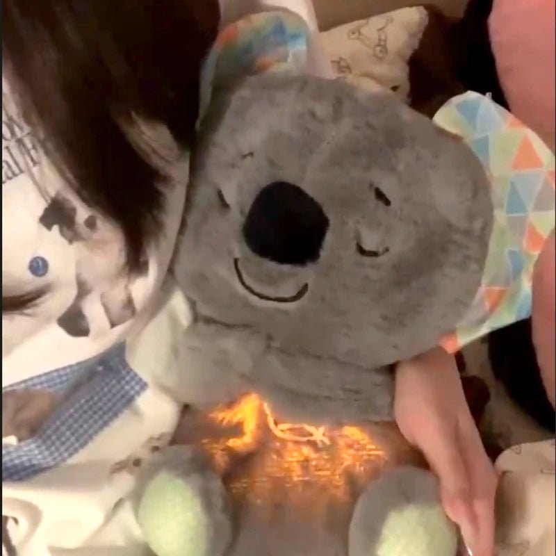 Soothing plush bear lying down with glowing belly light and smiling face