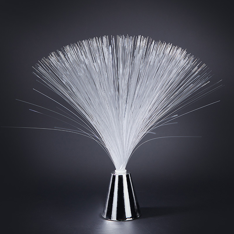 Fiber optic colour-changing lamp with silver fiber strands and chrome cone base