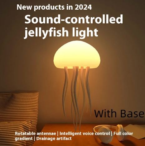 Jellyfish mood lamp with glowing silicone jellyfish dome and dangling tentacles, with base