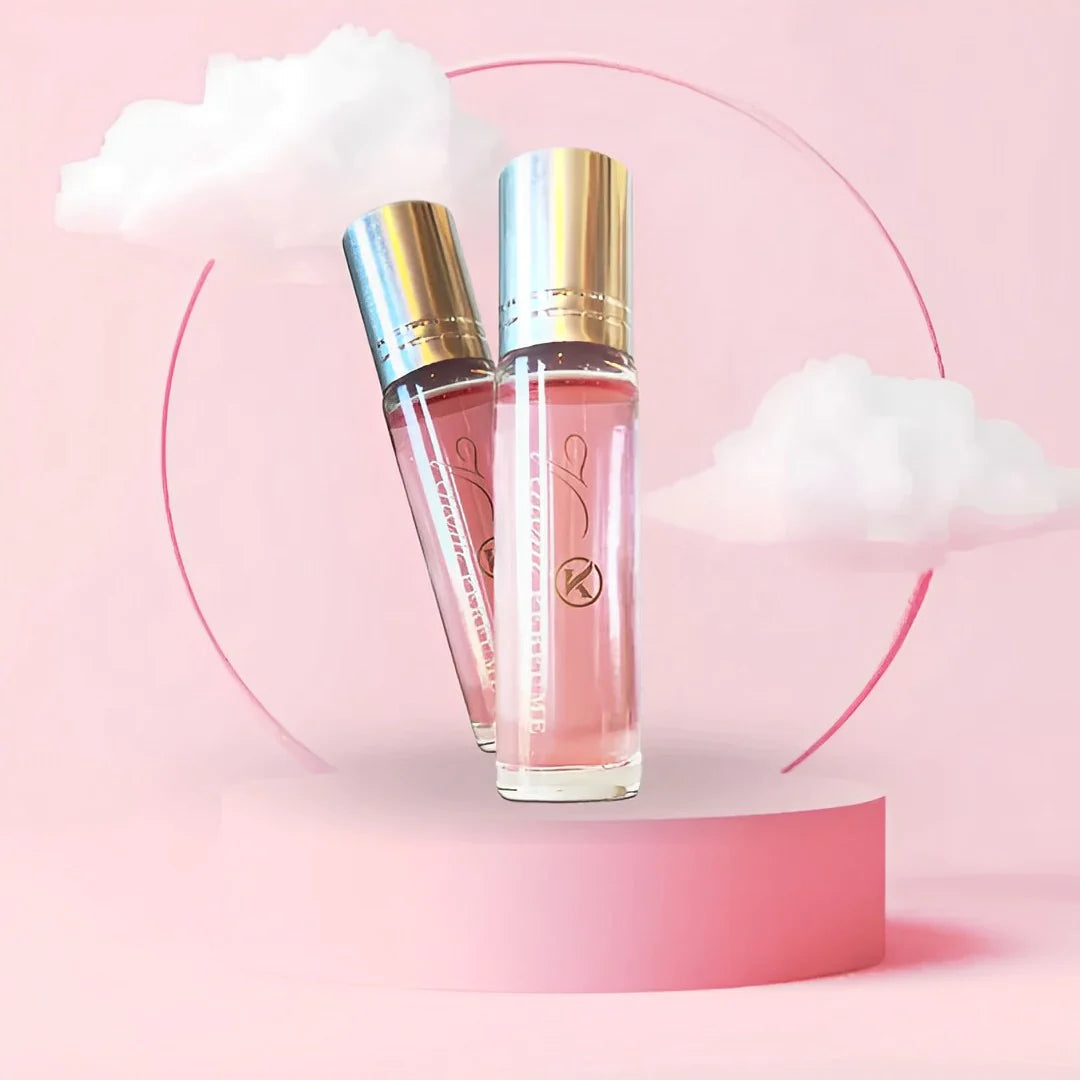 Pink perfume roller bottles with silver caps, side-by-side