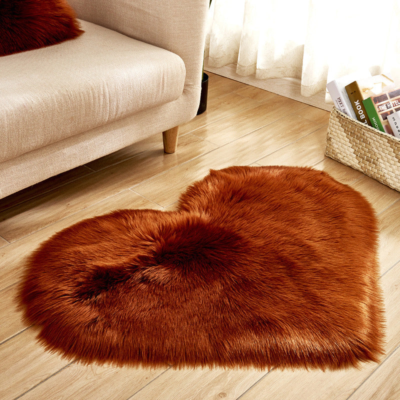 Heart-shaped plush rug, long-pile faux fur in warm rust-brown, full heart silhouette