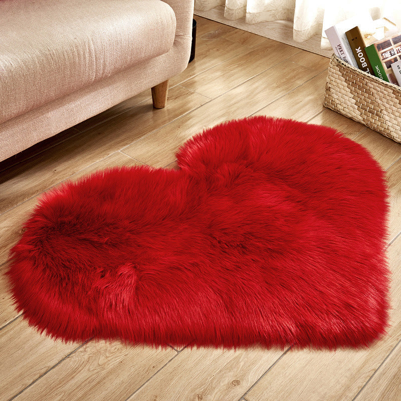 Heart-shaped plush shag rug in red with long fibers and non-slip backing
