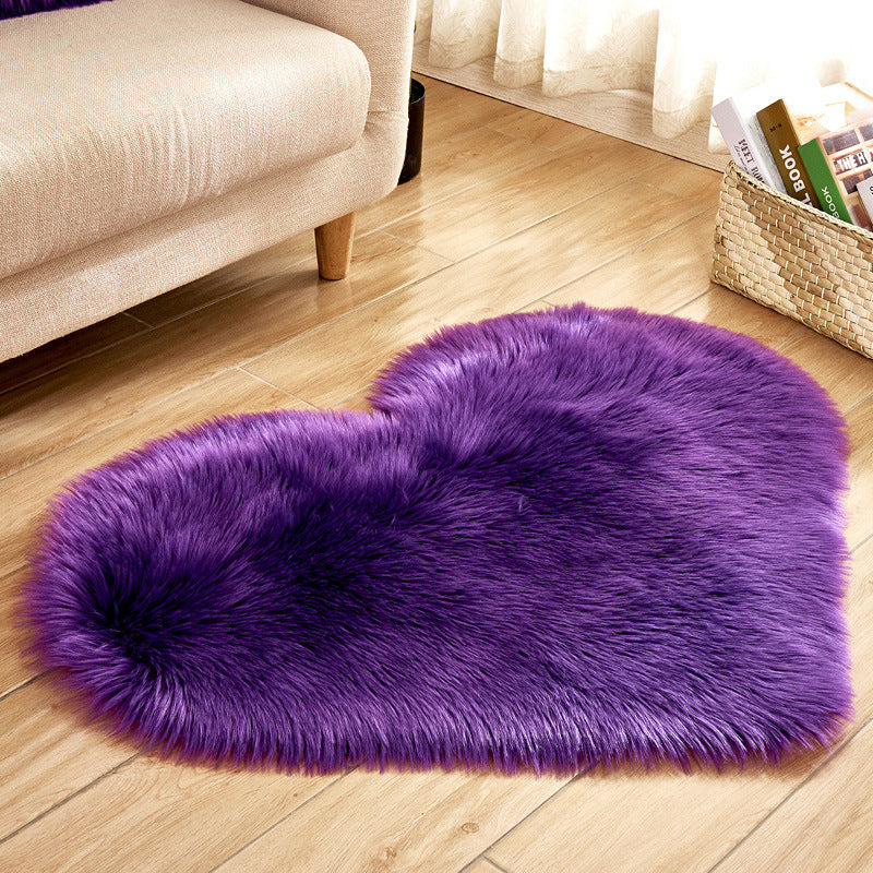 Purple heart-shaped plush rug with long shag pile