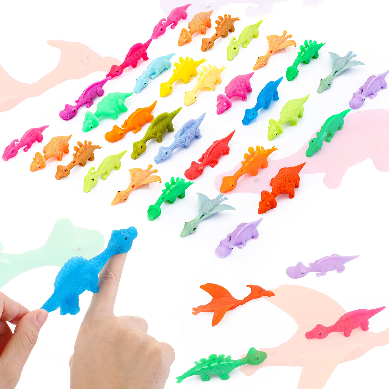 Assorted colorful dinosaur slingshot finger toys laid out for selection