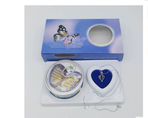 Wish pearl necklace gift set with blue heart pendant, chain, and round keepsake container