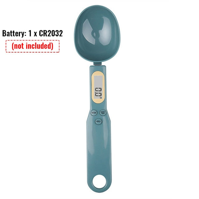 Digital measuring spoon scale, teal glossy body with LCD screen and spoon bowl