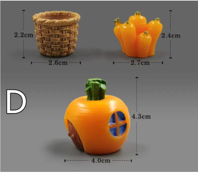Mini resin accessories: wicker basket and orange flower-like cluster with green tops.
