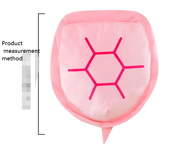 Plush turtle-shell pillow wrap, pink with magenta segmented shell pattern front view