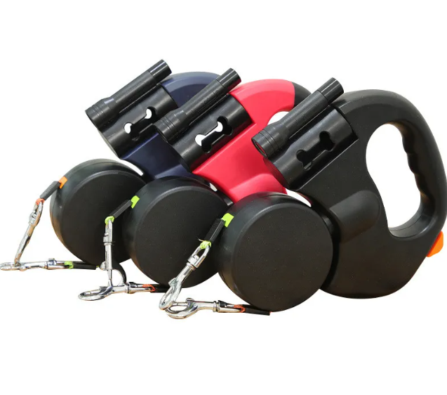 Dual retractable dog leash set with black and red reels, extendable leads, metal clips