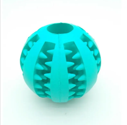 Dog treat dispensing rubber ball in turquoise-blue with raised spikes and center divider