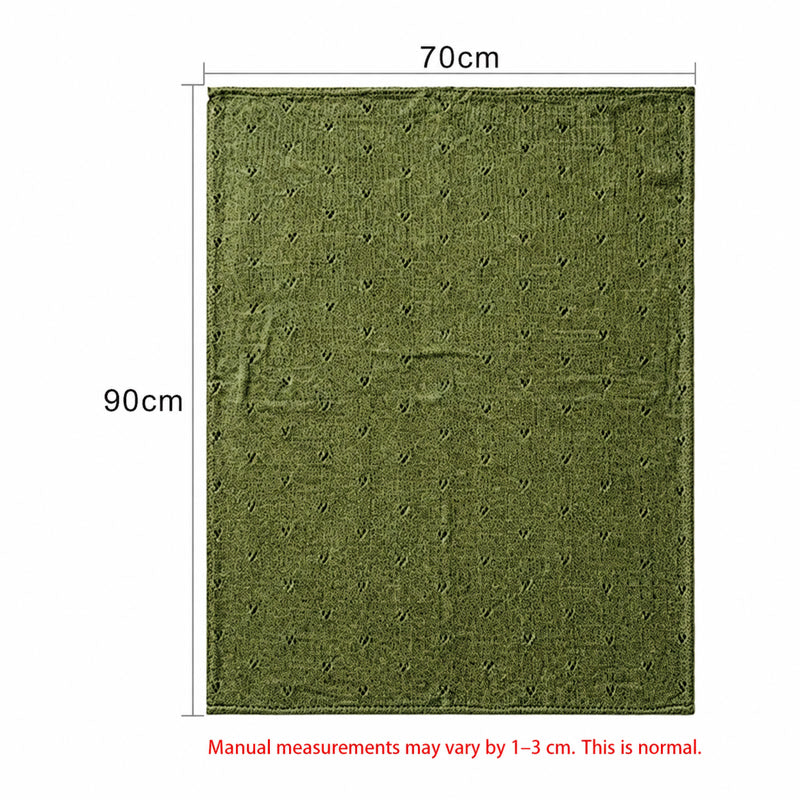 Green hand-embroidered cotton baby blanket with hollow-stitch pattern, 70 x 90 cm