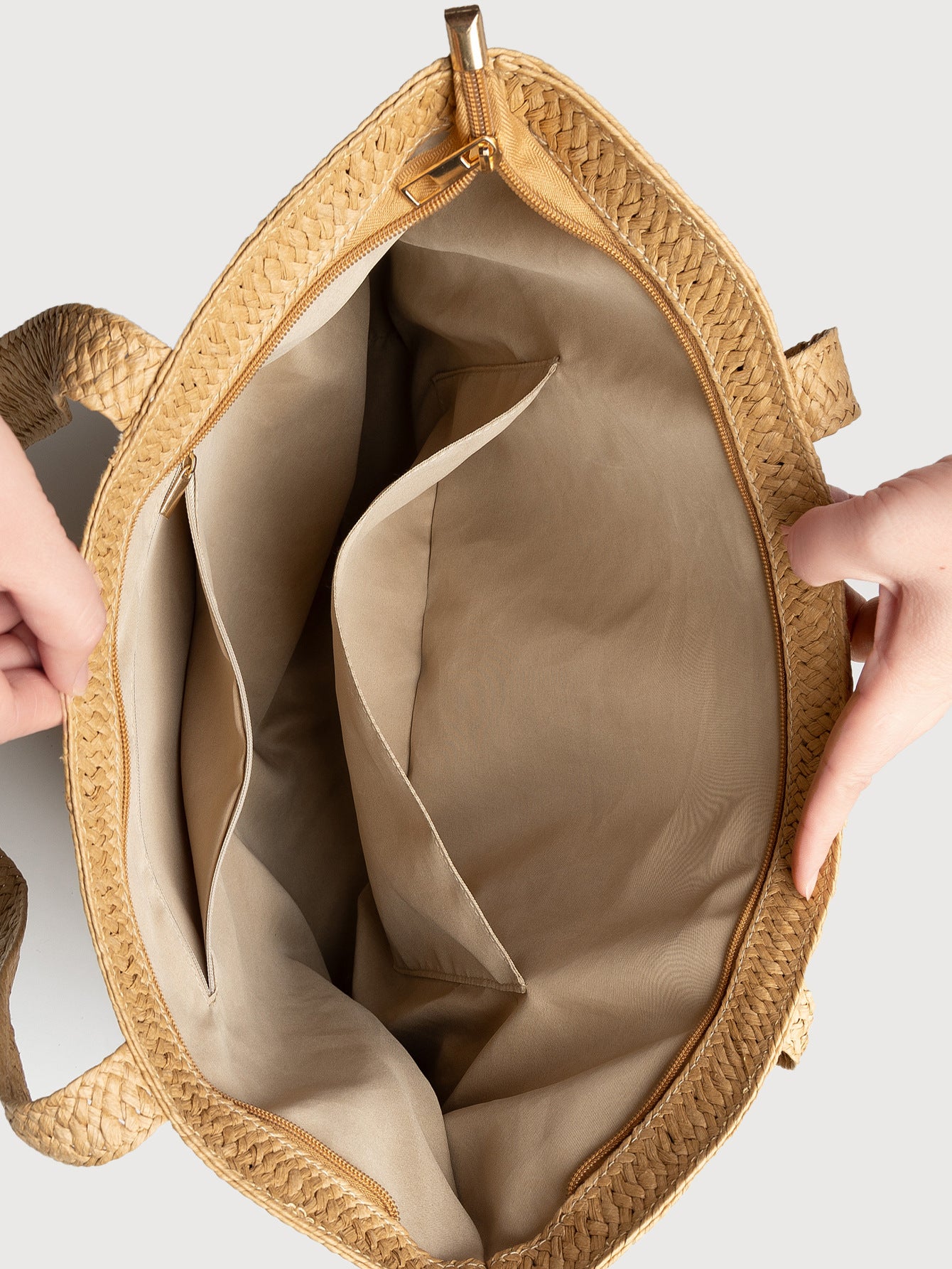 Apricot straw tote bag interior view with open top and beige lining