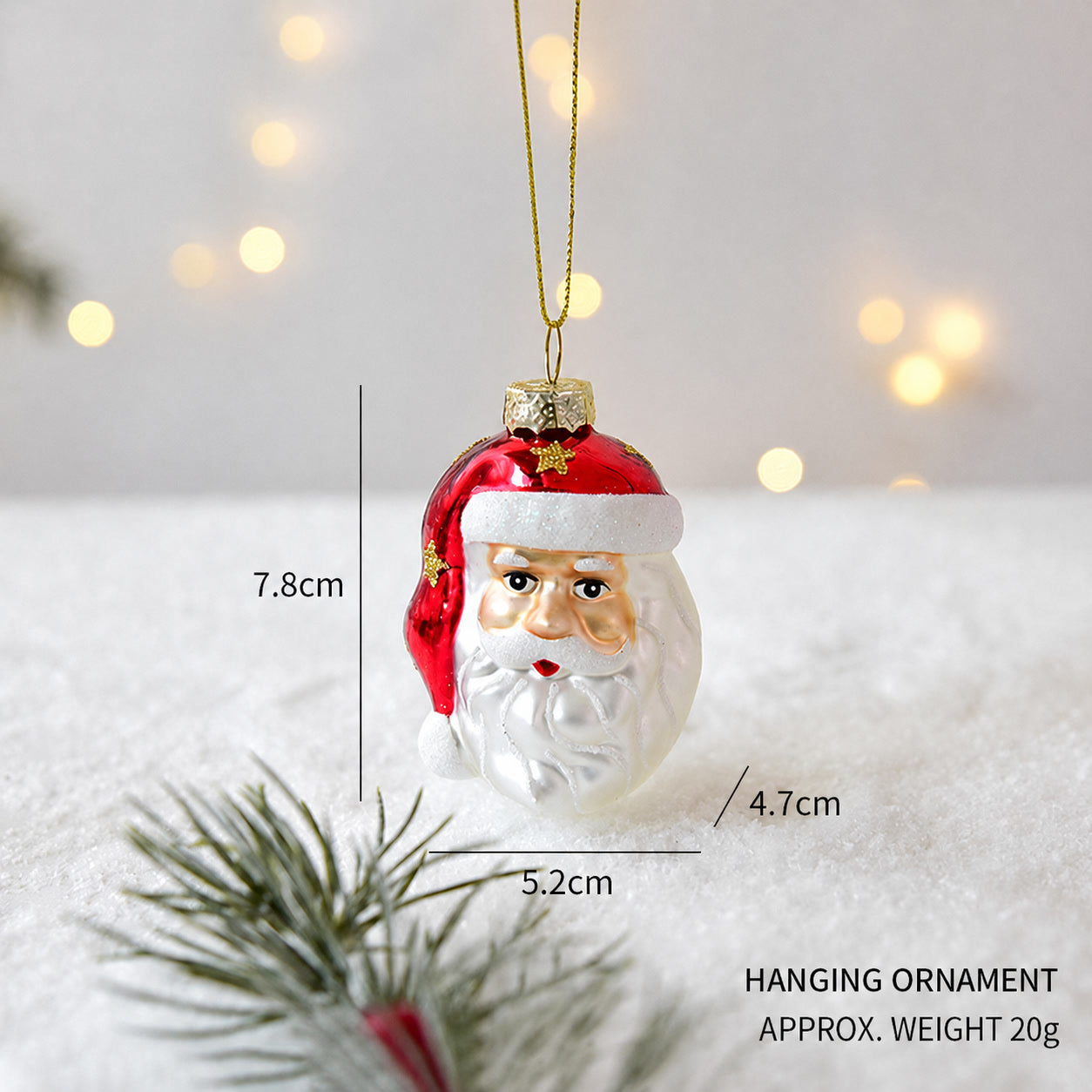 Handmade glass Christmas face hanging ornament with red hat and gold hanger