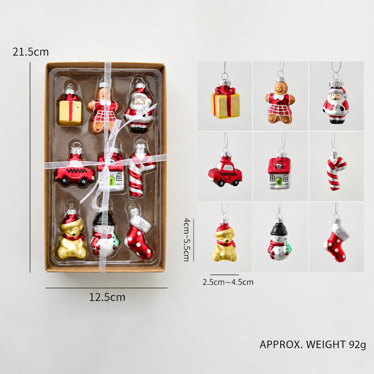 Boxed set of small red and white glass figurine ornaments with hanging hooks