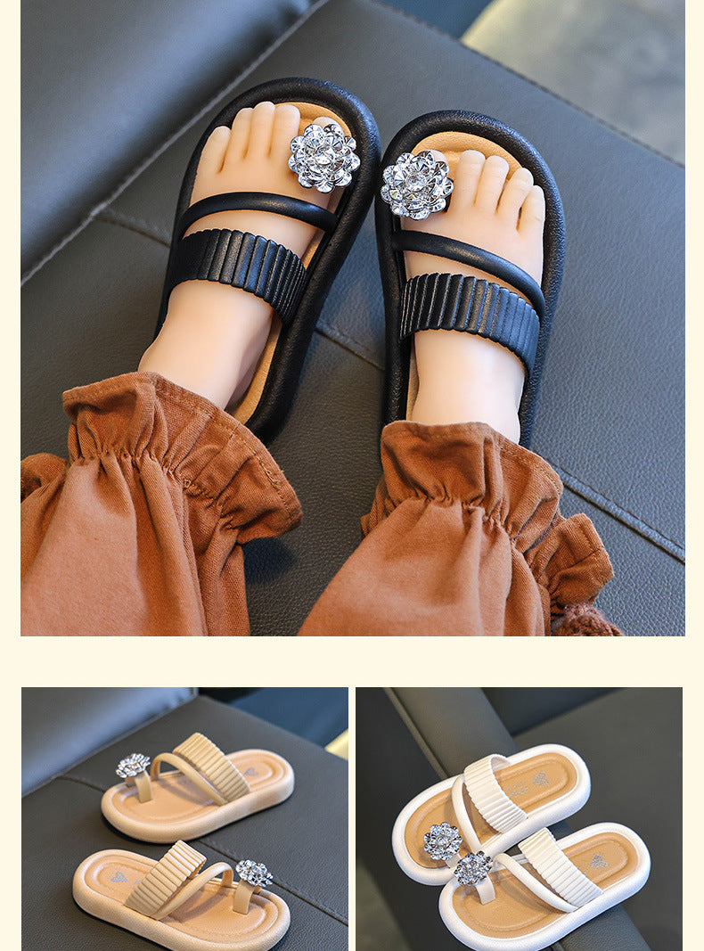 Girls’ black flip-flop sandals with rhinestone flower jeweled straps and soft sole