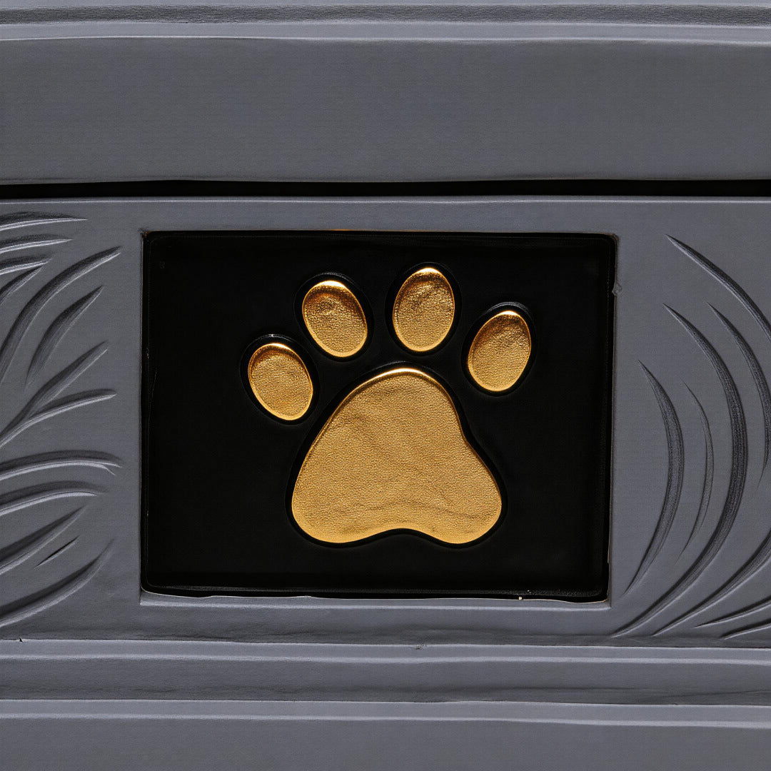 Gold paw print emblem on gray resin memorial urn front panel