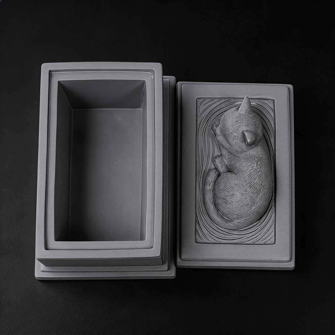 Gray resin cat memorial urn with open compartment, sleeping cat relief and gold paw emblem
