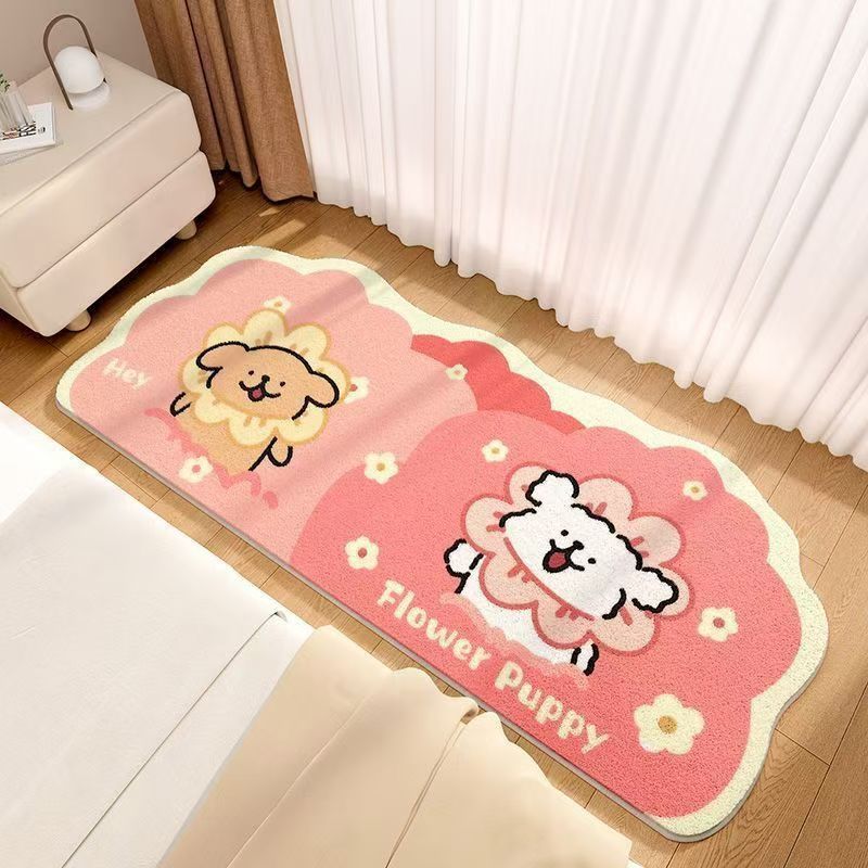 Pink rectangular bedroom mat with two cartoon puppies and flower shapes