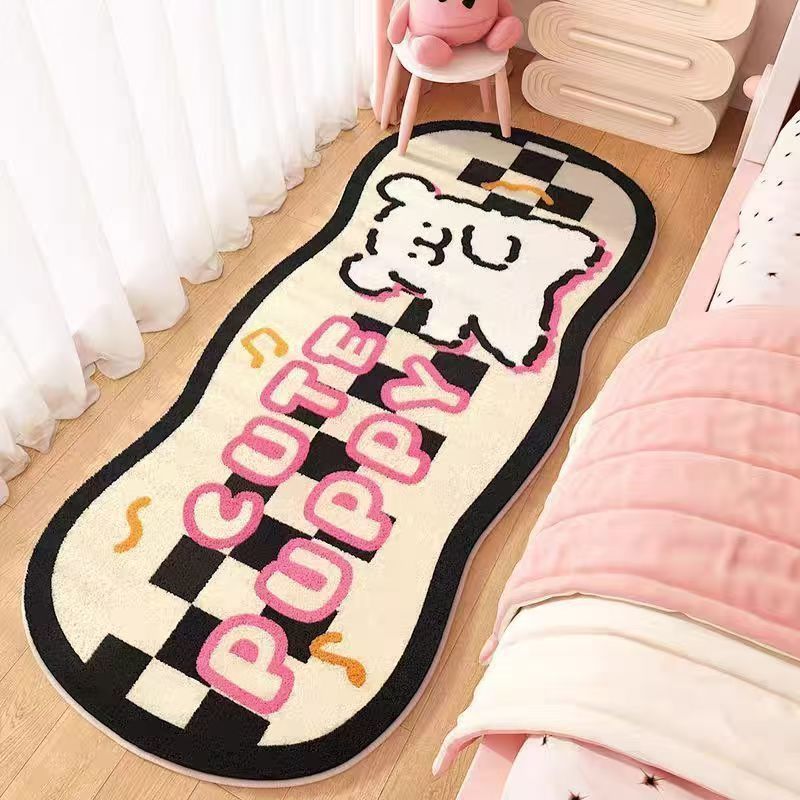 Cream bedroom mat with black border, cartoon puppies, and large colorful letters