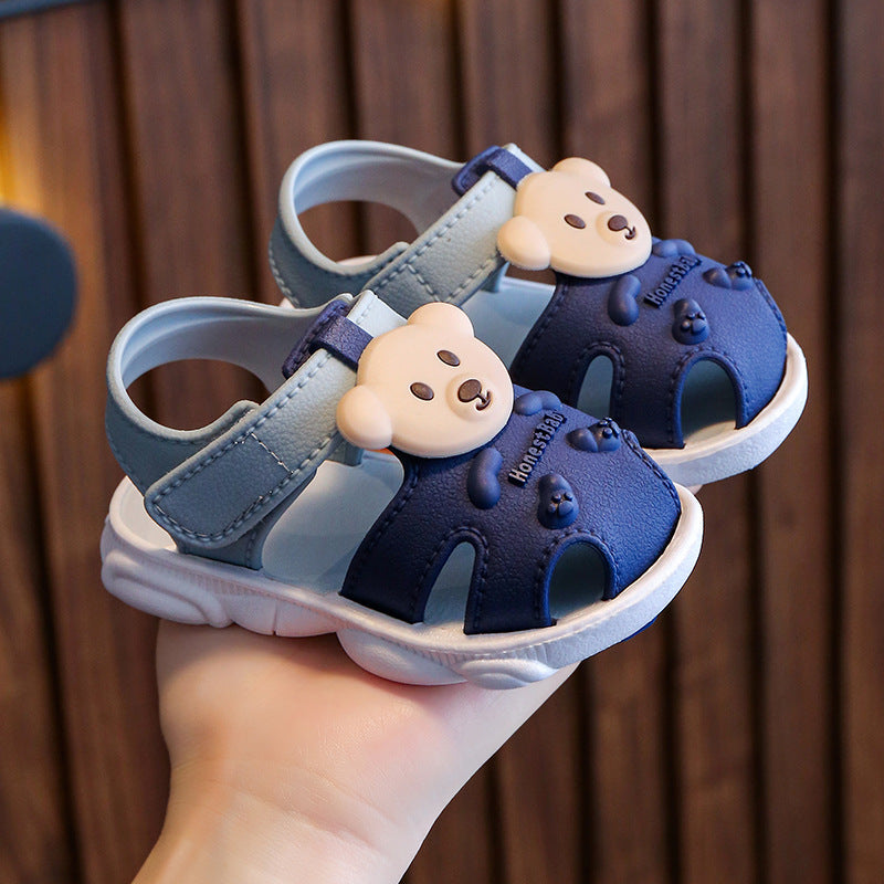 Kids bear-themed sandals with Velcro straps, blue and gray, light soles with traction