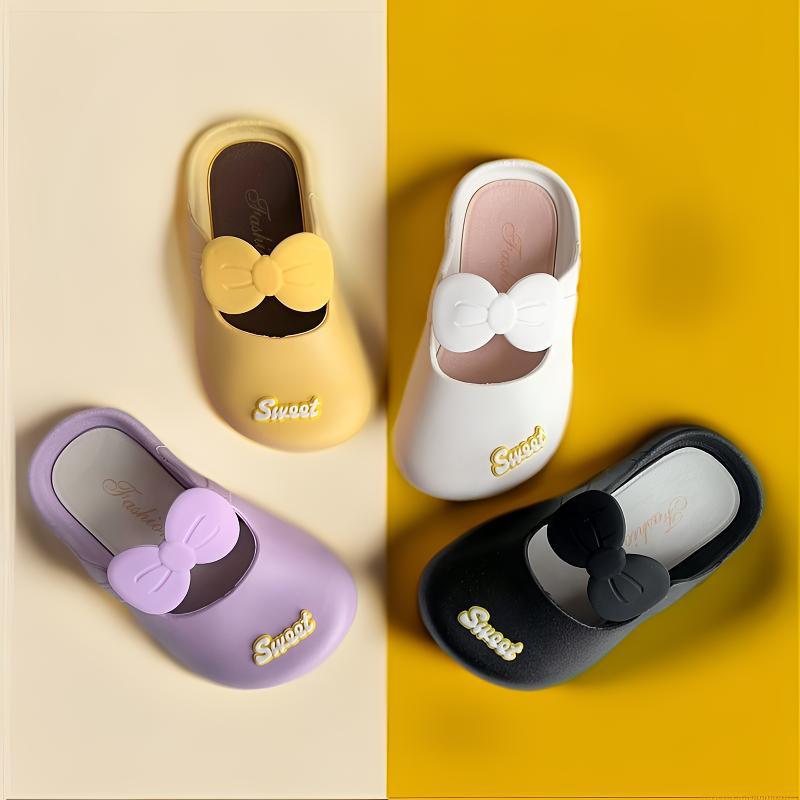 Girls' bow indoor slippers set in purple, white, black, and yellow with soft non-slip soles