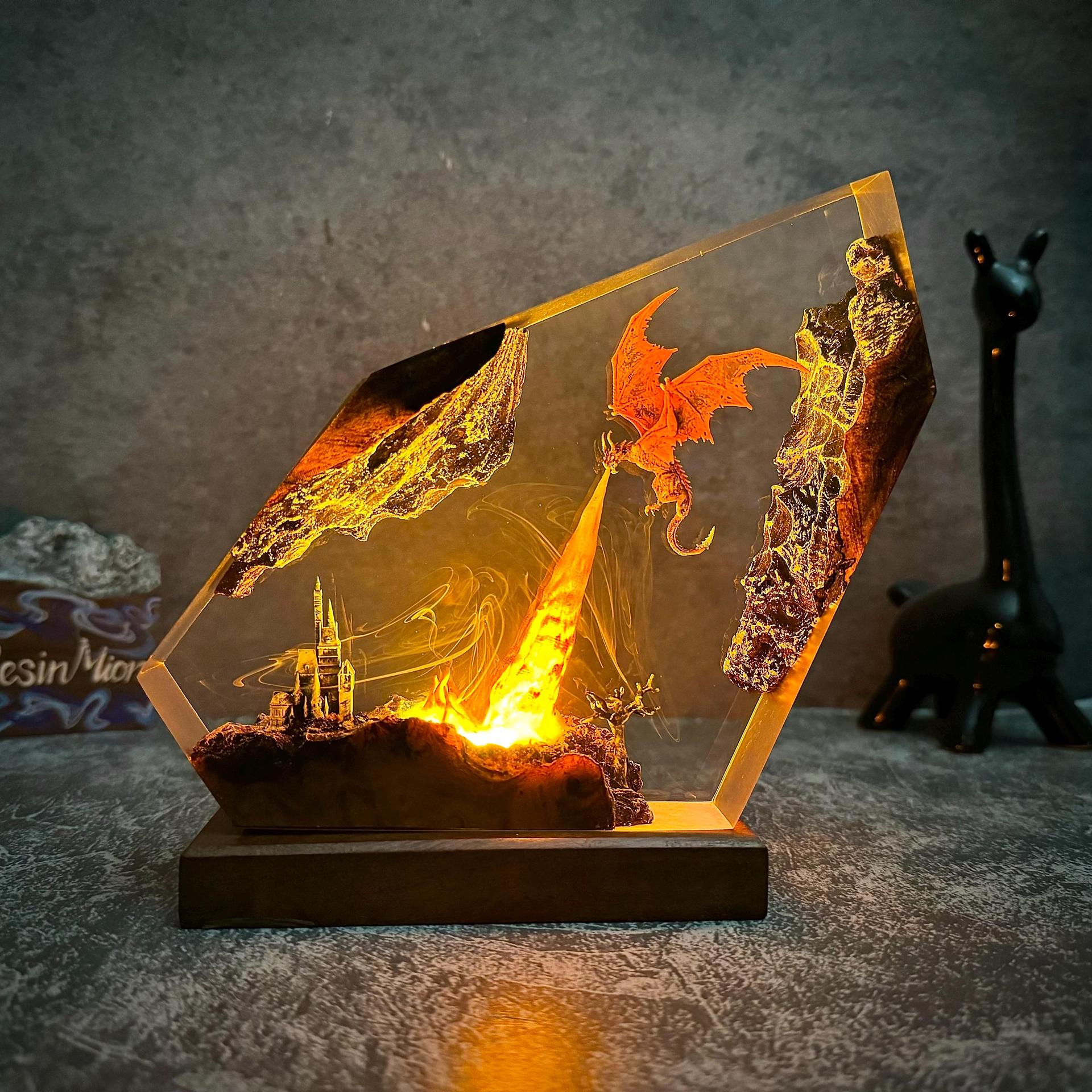 Fire dragon resin art lamp glowing orange, dragon silhouette with city ruins in clear frame