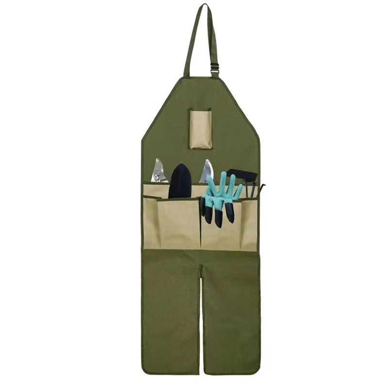 Green gardening leg apron with top patch pocket and tool holders on the front panels