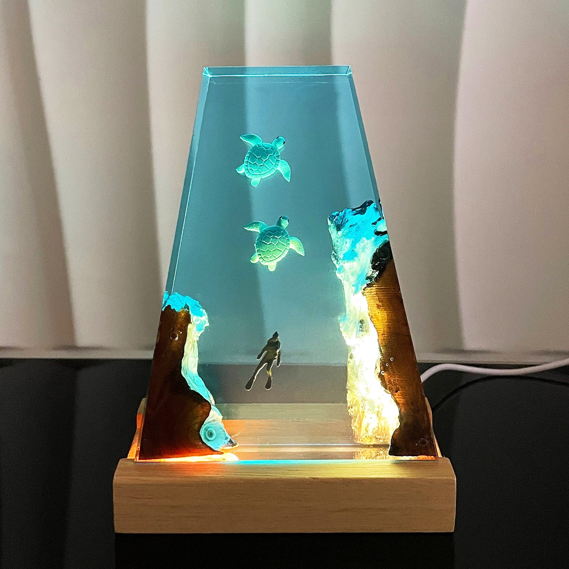 Wood night lamp with glowing blue resin sea-turtle scene