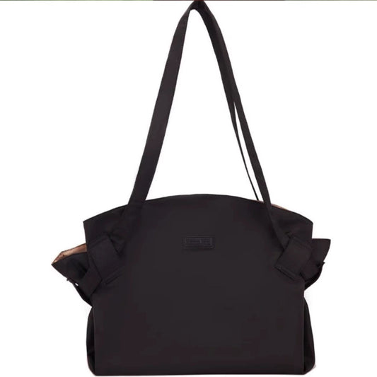 Black large-capacity travel duffel bag with top handles and shoulder strap