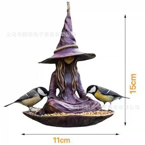 Purple hanging witch bird feeder; approx. 15 cm high and 11 cm wide (dimensions)