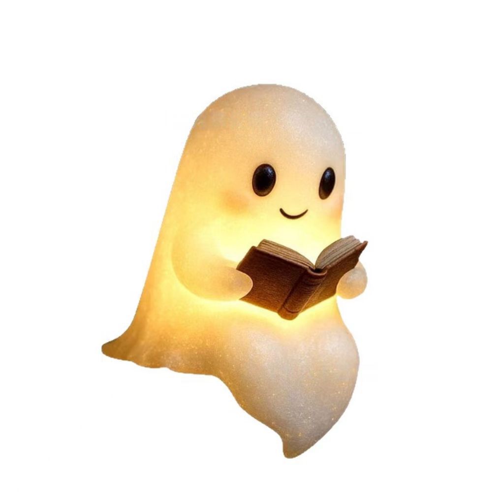 Cute ghost reading book lamp ornament, warm glowing open-book design