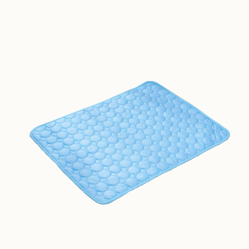 Sky blue ice silk cooling mat with raised honeycomb texture and rounded corners
