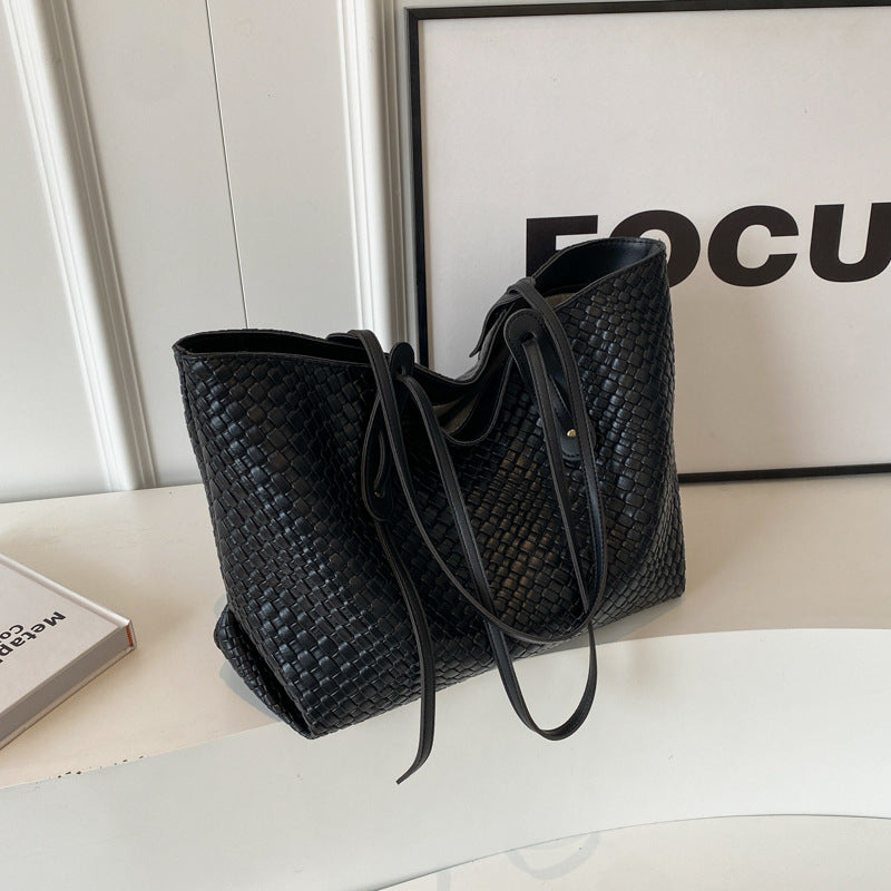 Woven PU tote bag in black with double straps and wide open top