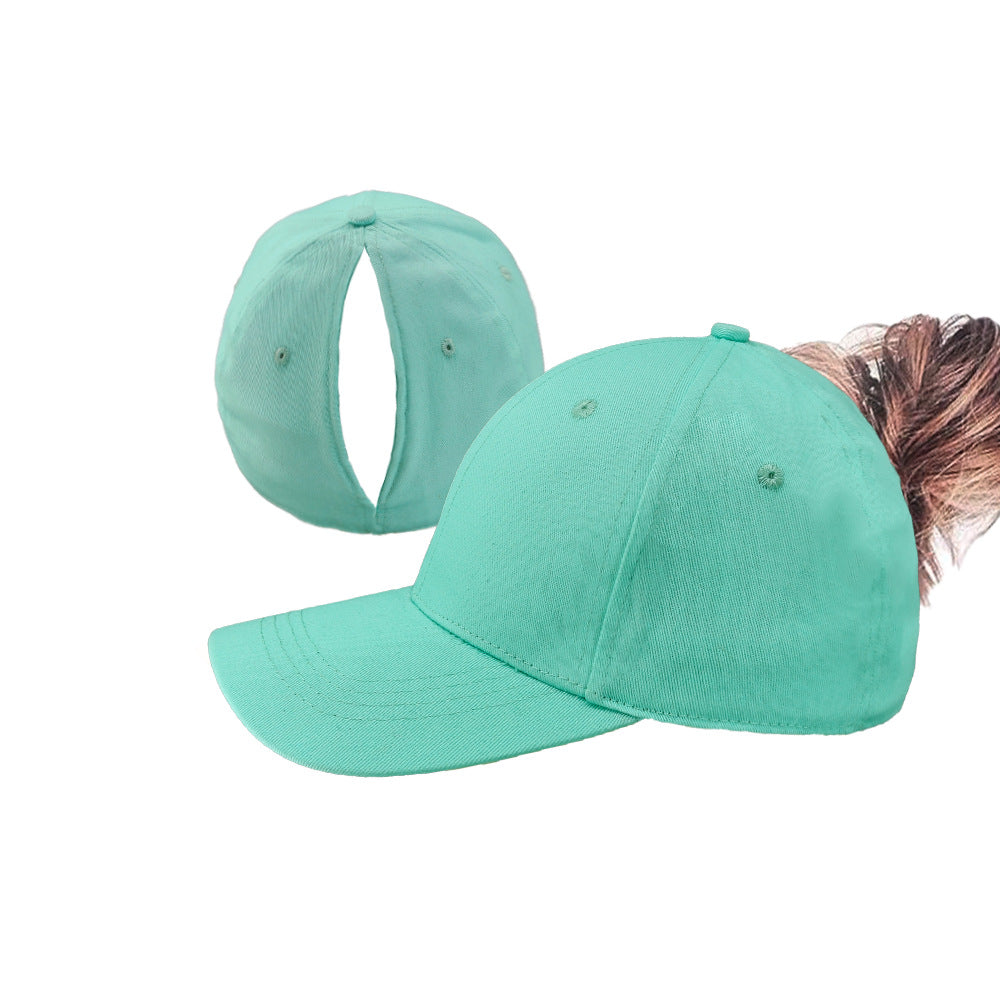 Light teal ponytail baseball cap with open back and curved brim